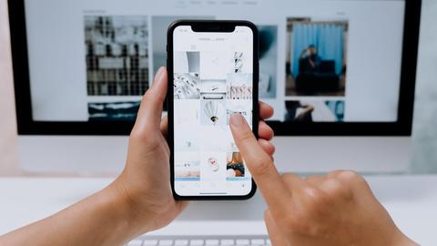 a person using a phone that has images on its screen